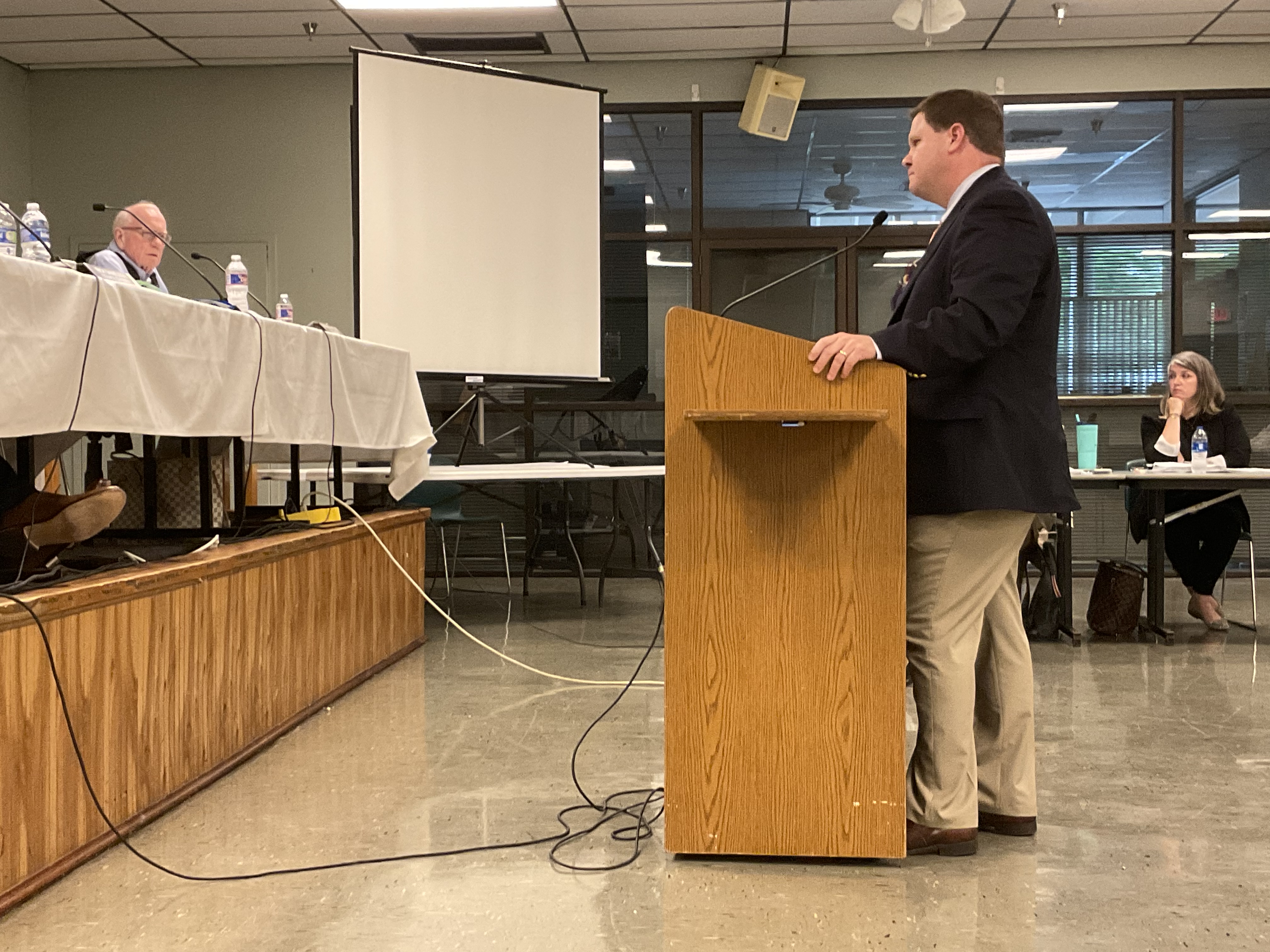 District II Councilman Skelly Kreller and Mayor Clay Madden face off during debate over the proposed contract to hire a disaster planner at the May 27, 2021, Mandeville City Council Meeting (Mandeville Daily/William Kropog)