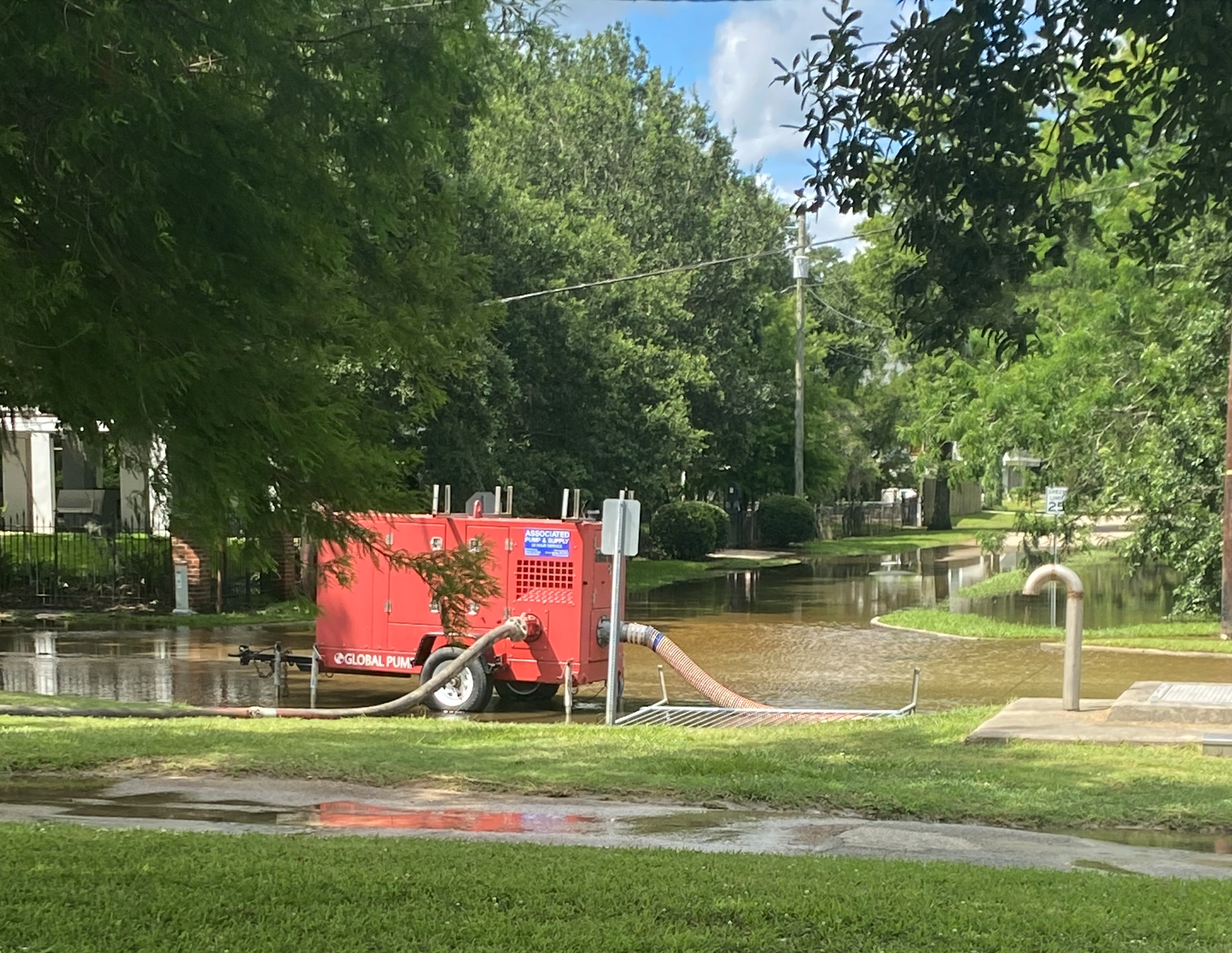 A mobile pumping system was deployed to try to help speed up receding flood waters, as Lakeshore Drive is open again. (Mandeville Daily/William Kropog)